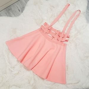 Pink full circle skirt with suspenders and pearl zipper